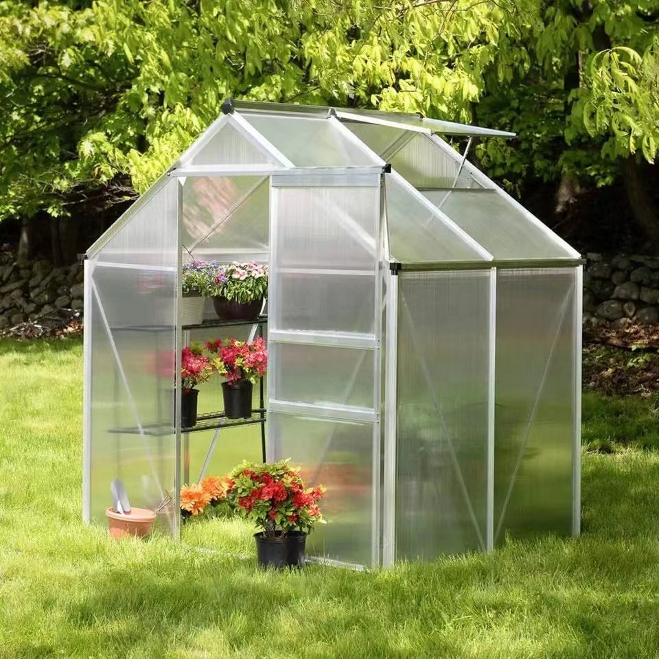 with solar panels to maintain temperature, prevent wind and snow Planting plants small glass garden greenhouses