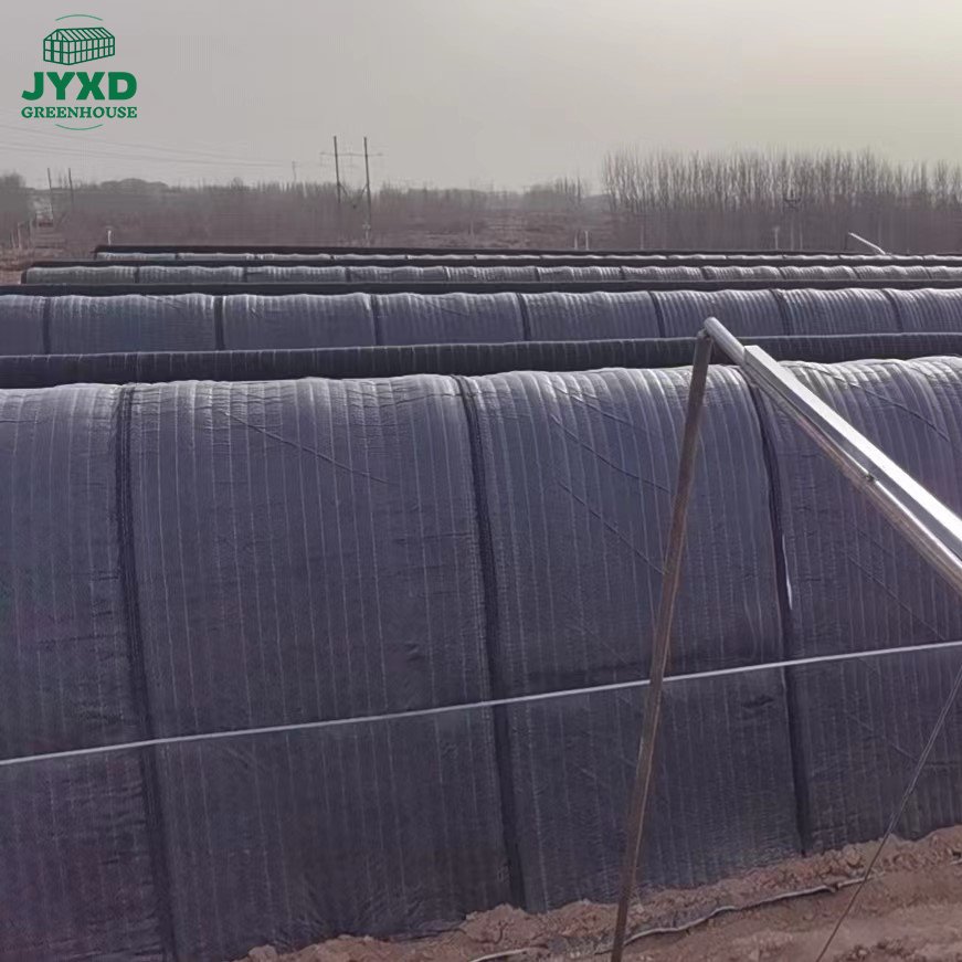Cold resistant covering material for greenhouse with greenhouse insulation quilt