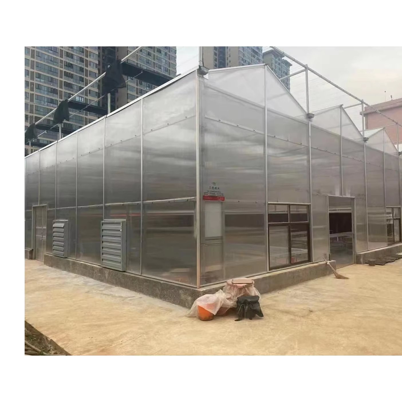 Factory hot sale polycarbonate pc panel greenhouse high tunnel plastic film side ventilation multi-span greenhouse