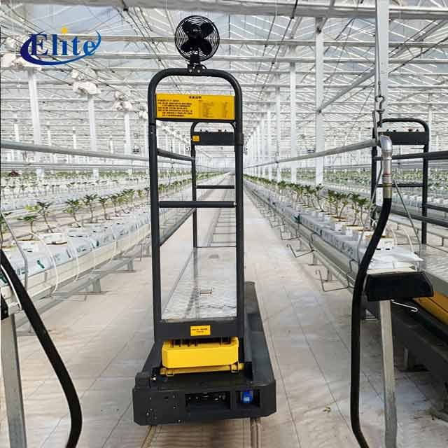 Electrical lift pipe rail trolley for greenhouse picking and maintaining