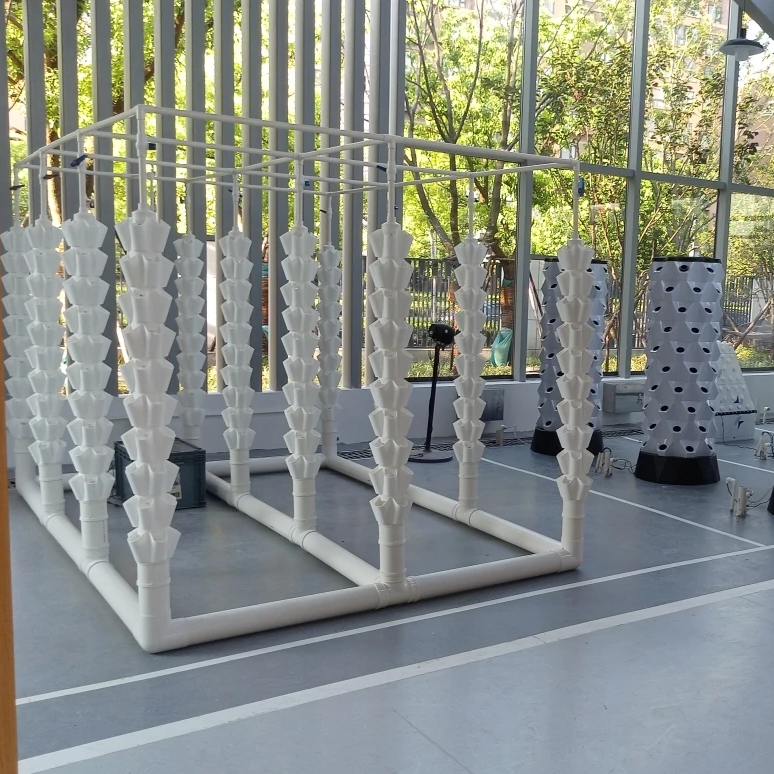 Agriculture vertical growing hydroponic towers for vegetables with water pumps