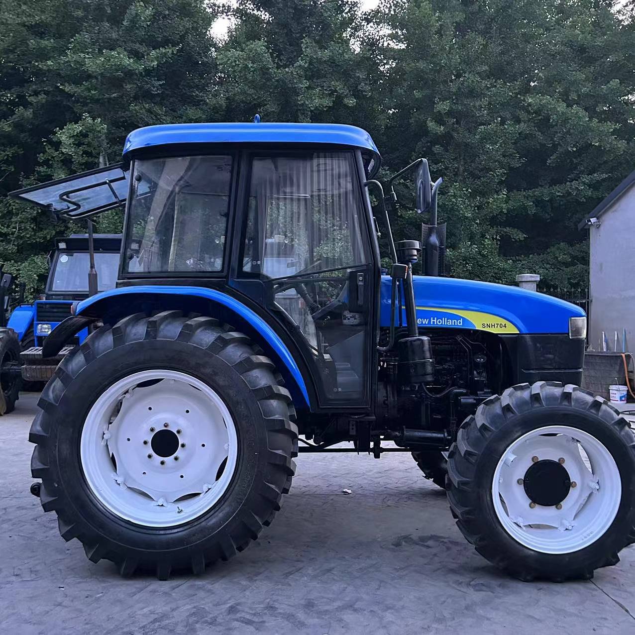 Newholland SNH704 70HP with Cab 4WD Shanghai New and Holland Used Tractor with Cabin for Hot Sale