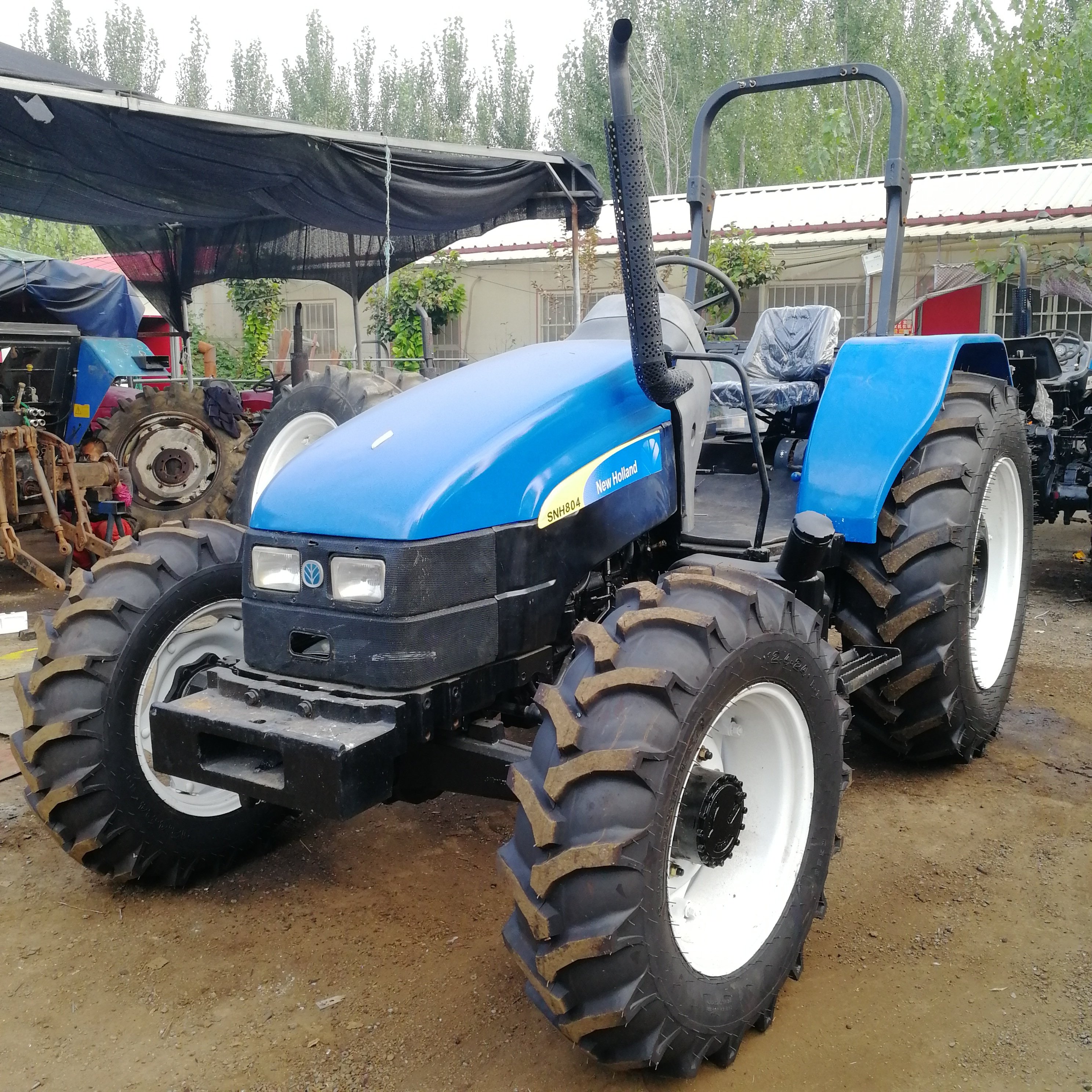 Used/second Hand Farm Wheel Tractors New Holland SNH804 4x4wd Agricultural Machinery Front End Loader TD5 TT75 Low Cheap