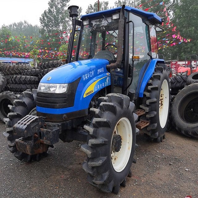 Holland Farm Tractor T1404 with Cab 4WD NewW Ferguson 140 HP with Big Tires Strong Engine Good Condition