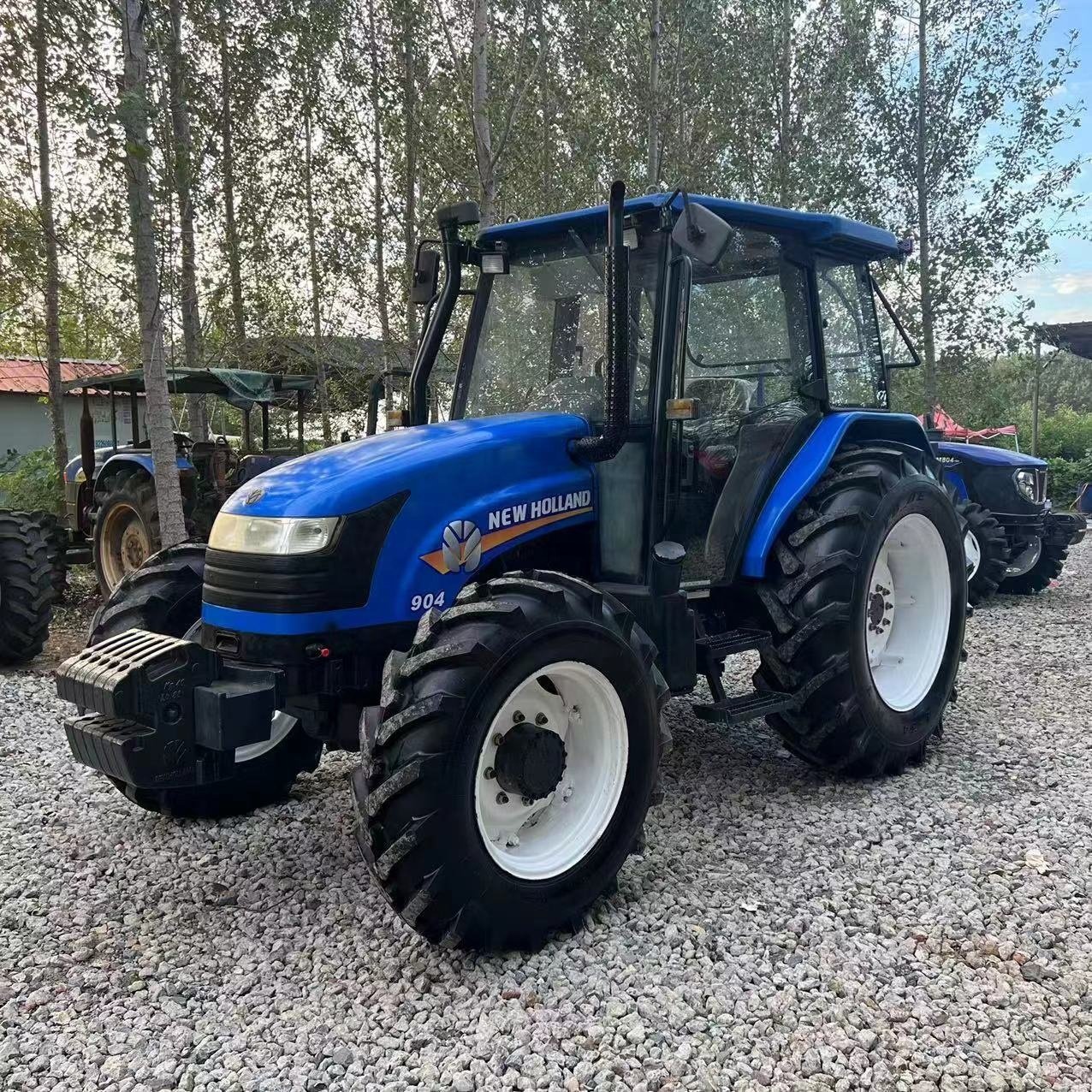 Holland Farm Tractor T1404 with Cab 4WD NewW Ferguson 140 HP with Big Tires Strong Engine Good Condition