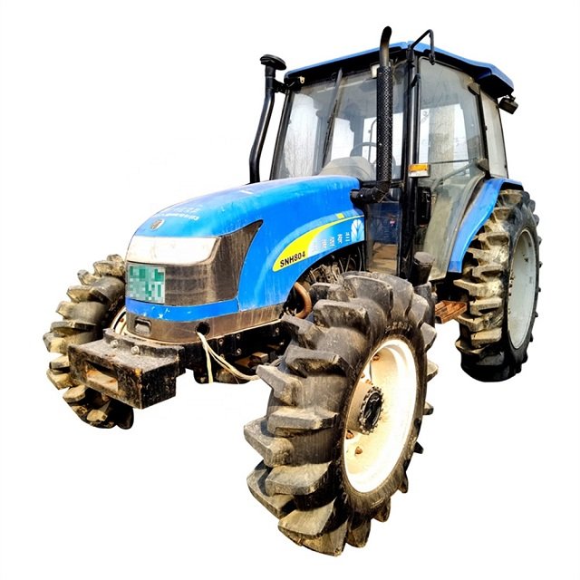Holland Farm Tractor T1404 with Cab 4WD NewW Ferguson 140 HP with Big Tires Strong Engine Good Condition