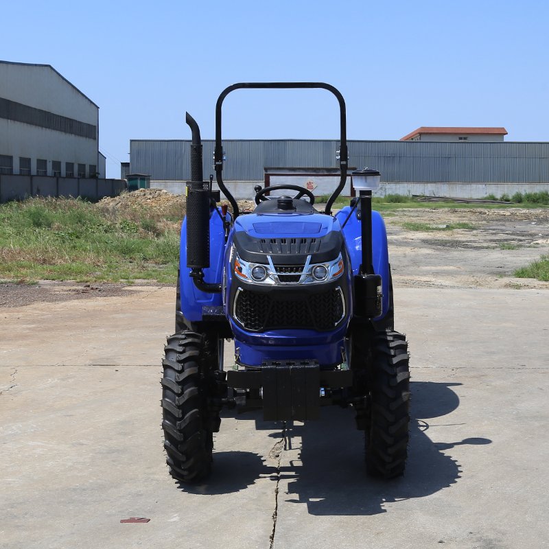 Factory Supply Agricultural Machinery 4x4 Four Wheel Multifunction Small Mini Farm Tractor with Plough