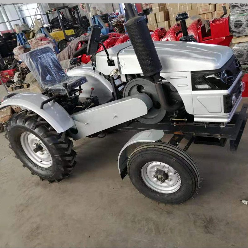 China Batch Supply 18hp Four Wheel Farm Mini Tractor for Sale with Disc Plough