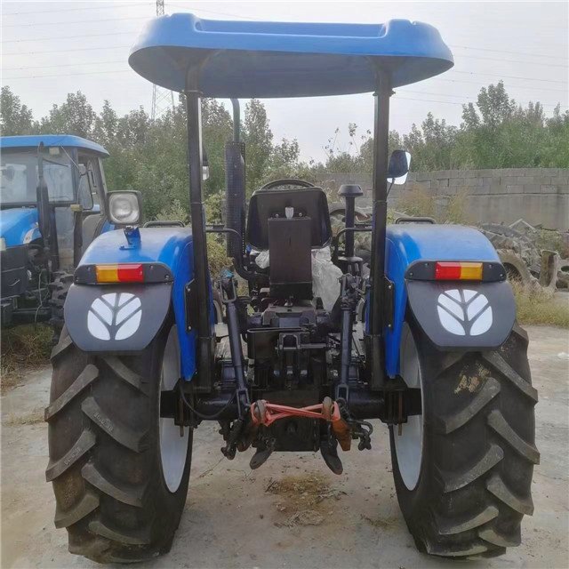 Snh 754 Snh 704 Tt75 Used New Holland Tractor with Front Loader