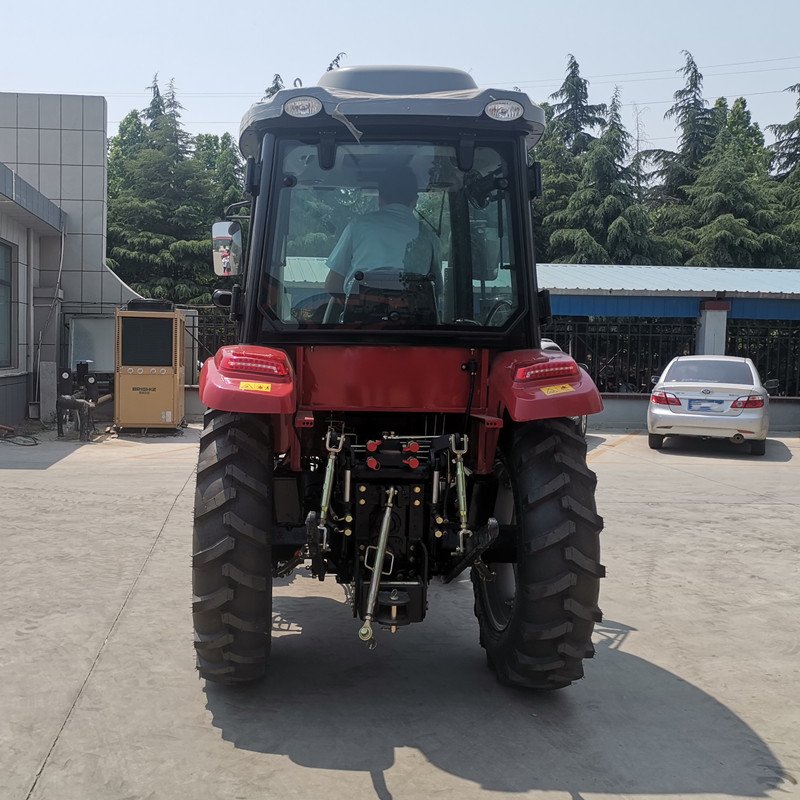Shandong Factory's Mini Farming 70hp Tractor 4WD Wheel with Front Loader Essential Engine and Pump Components