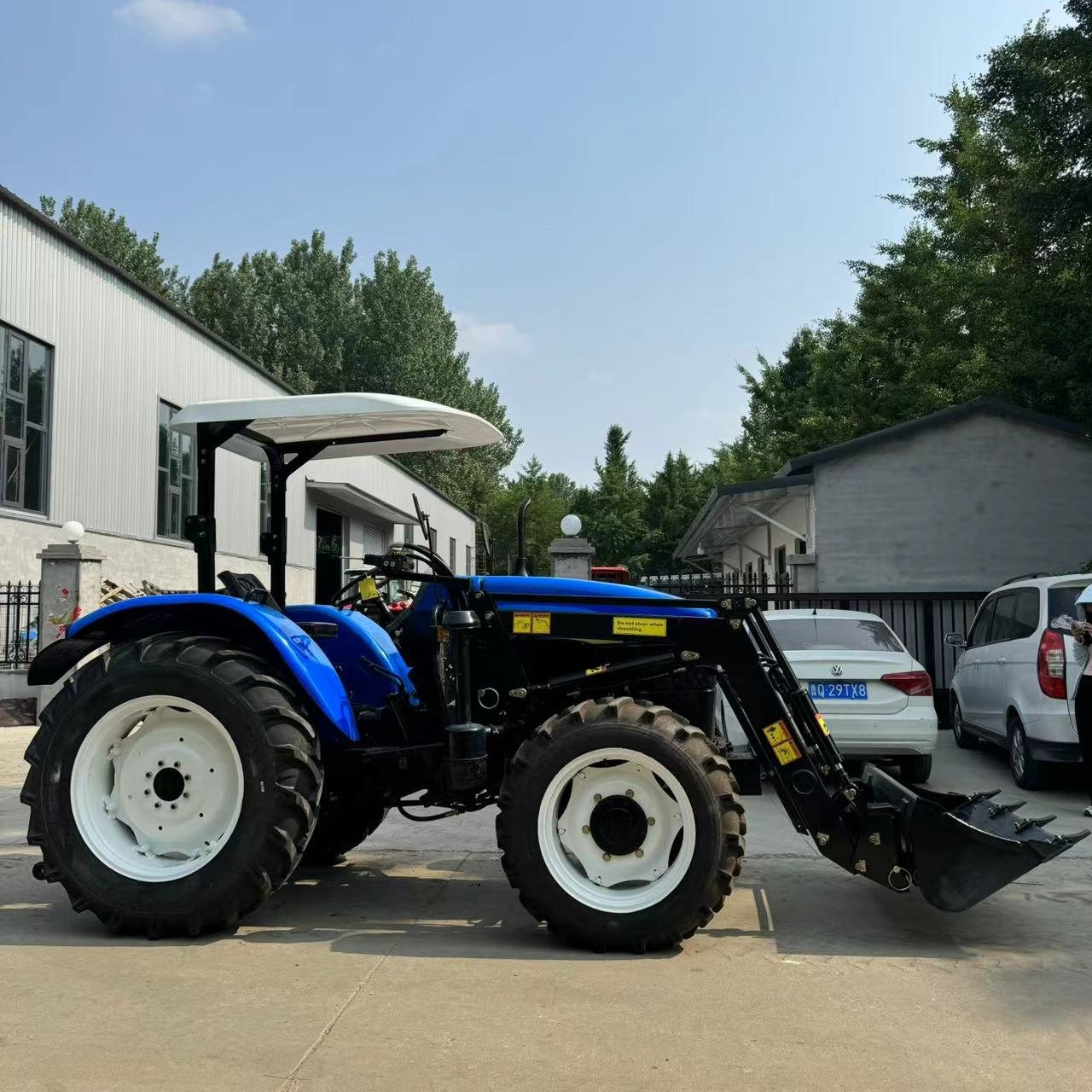Used New Holland 70HP Farm Tractor with Front Loader