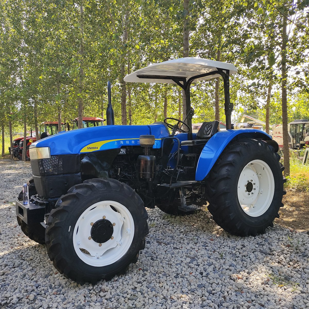 Snh704 New a Used Holland Agricultural Tractors Price Farm 80hp 90hp Tractors for Agriculture Used with China's High-quality