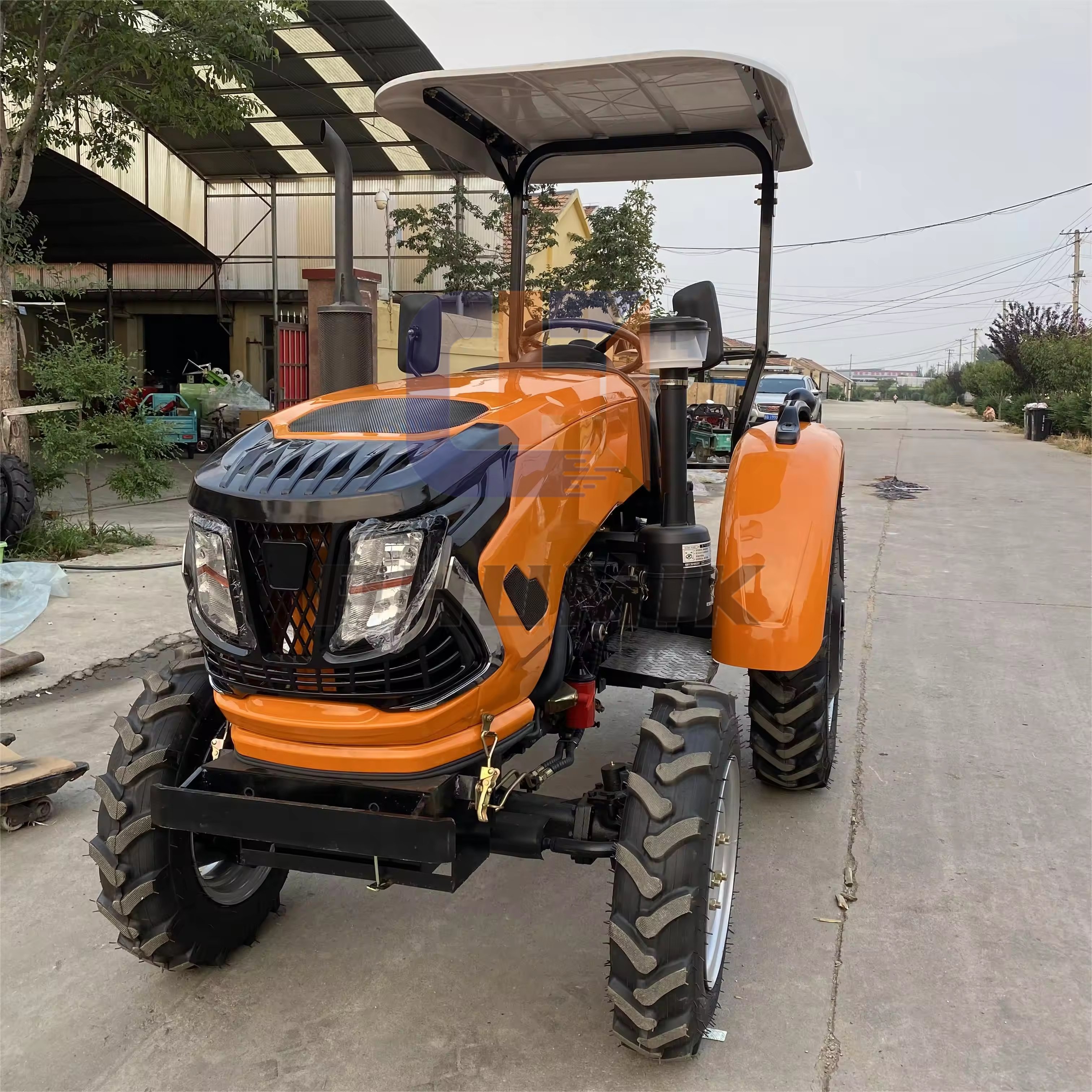 Strong Four-Wheel Drive Agricultural Tractor with Front Loader Disc Harrow Disc Plowing Machine