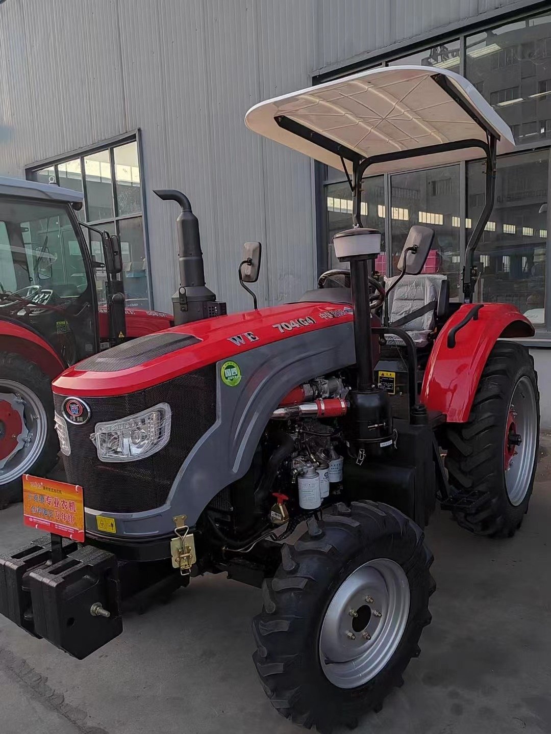 Farm Tractor with the Power of 60 hp in Red Color