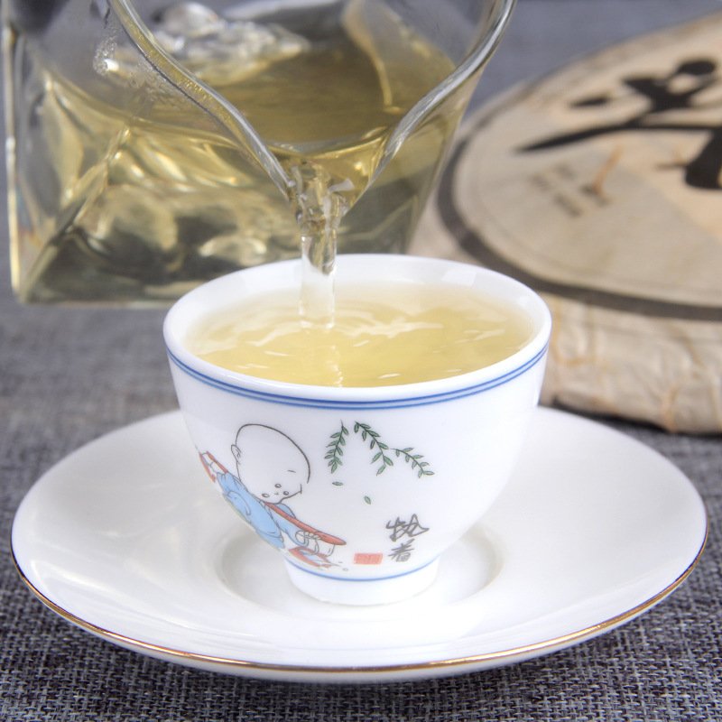 Factory supply shen Pu'er tea cake 357 gram unfermented yunnan qi zi bing cha with good taste