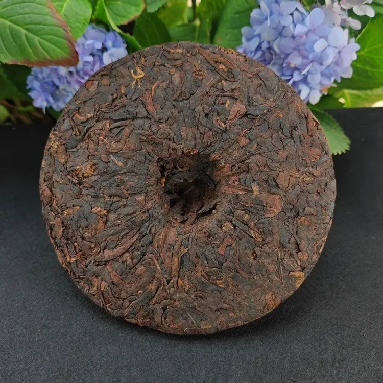 1 - 2 Years Quality Organic Pu'er 357g per piece Chinese Pu Er Yunnan Ripe Puer Cake Tea Aged Pu Erh Tea Supplier