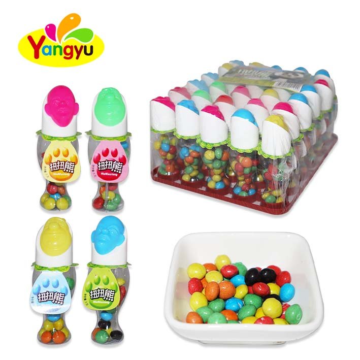 Wholesale new design high quality sugar bottle packaging chocolate bean lollipop candy Halal cartoon solid milk puffed candy
