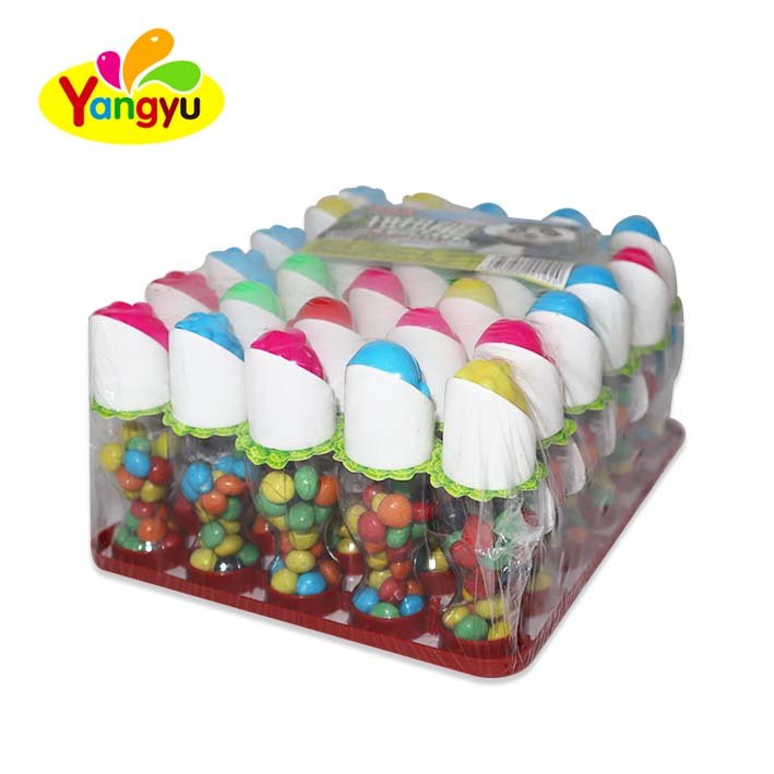 Wholesale new design high quality sugar bottle packaging chocolate bean lollipop candy Halal cartoon solid milk puffed candy