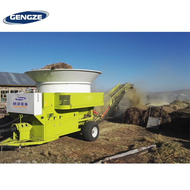 Large scale pasture ranchland using grass chopper machine for animals feed