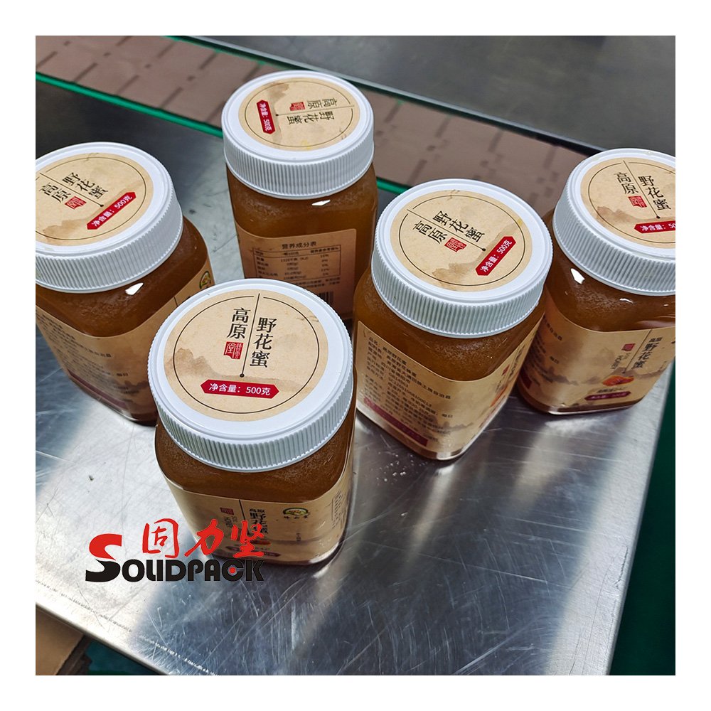 Solidpack full auto jar tomato processing plant pneumatic paste honey filling line