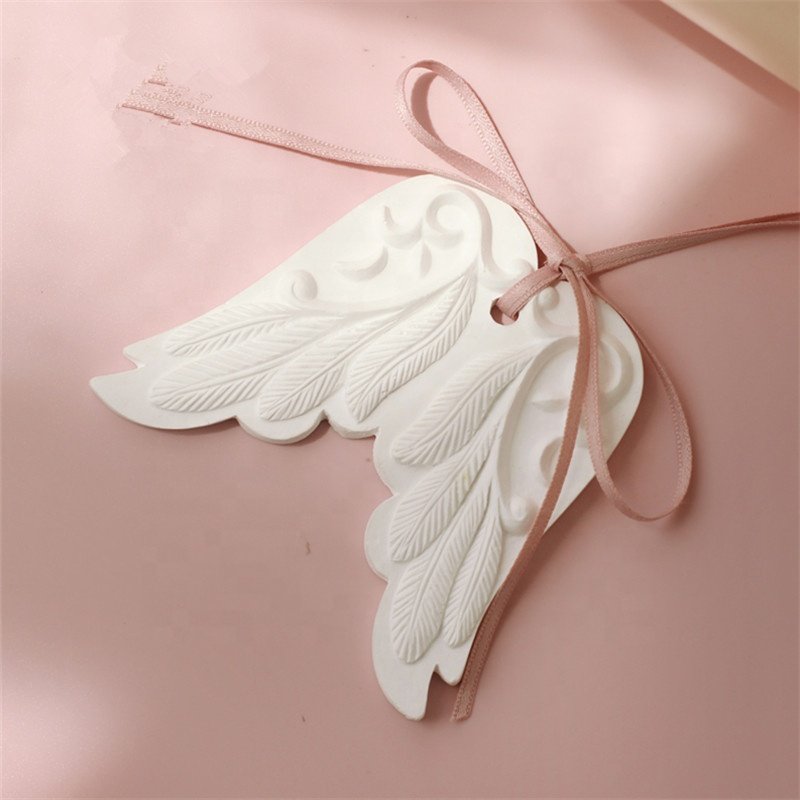 Wholesale Stocked White Wing Hanging Home Car Decoration Wardrobe Air Freshener Scented Ceramic Fragrance Essential Oil Diffuser