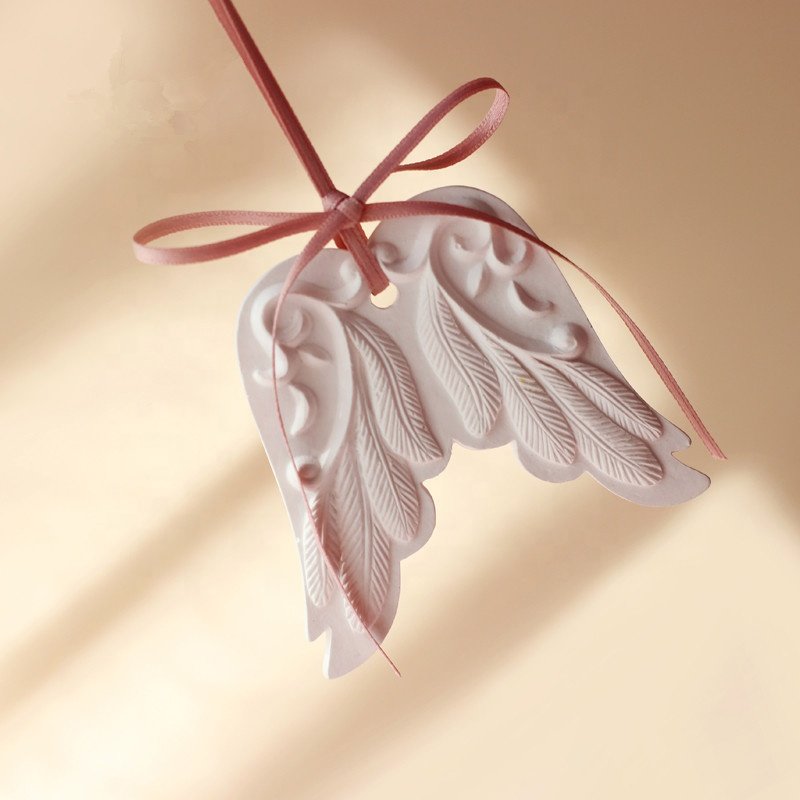 Wholesale Stocked White Wing Hanging Home Car Decoration Wardrobe Air Freshener Scented Ceramic Fragrance Essential Oil Diffuser