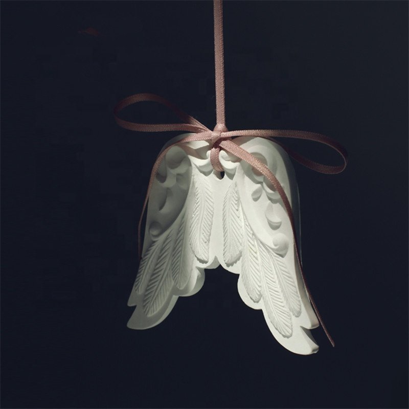 Wholesale Stocked White Wing Hanging Home Car Decoration Wardrobe Air Freshener Scented Ceramic Fragrance Essential Oil Diffuser