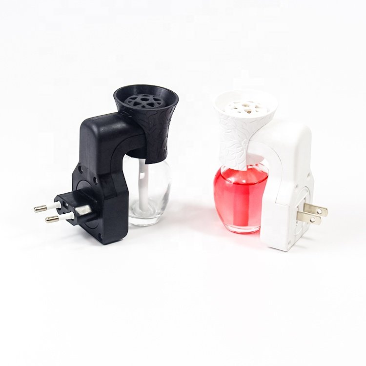 Factory wholesale New shape indoor use Glass Bottle Plugin aromatherapy device, liquid perfume heating diffuser