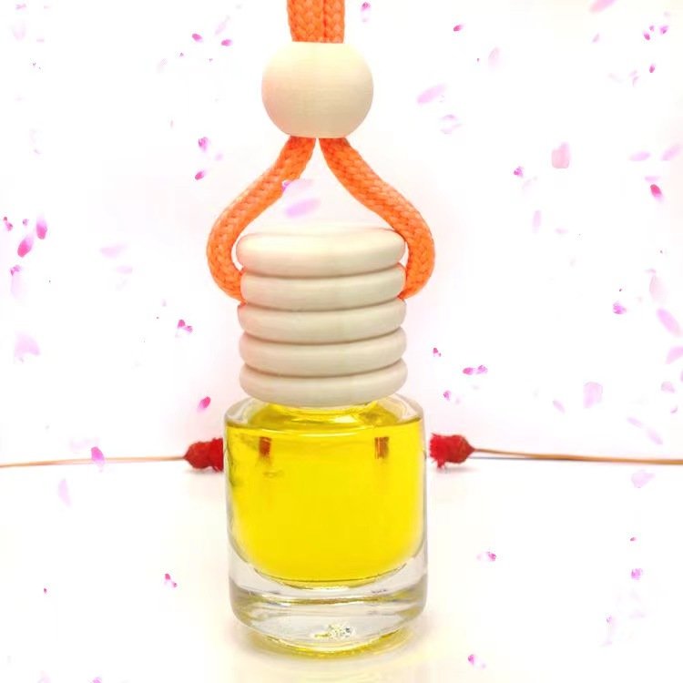 Luxury 5ML Clear Round Hanging Rope Glass Car Perfume Bottle Diffusing Forest Fragrance with Wooden Cap Air Freshener
