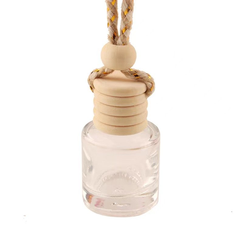 Luxury 5ML Clear Round Hanging Rope Glass Car Perfume Bottle Diffusing Forest Fragrance with Wooden Cap Air Freshener