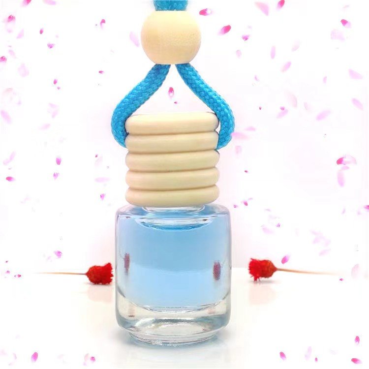 Luxury 5ML Clear Round Hanging Rope Glass Car Perfume Bottle Diffusing Forest Fragrance with Wooden Cap Air Freshener