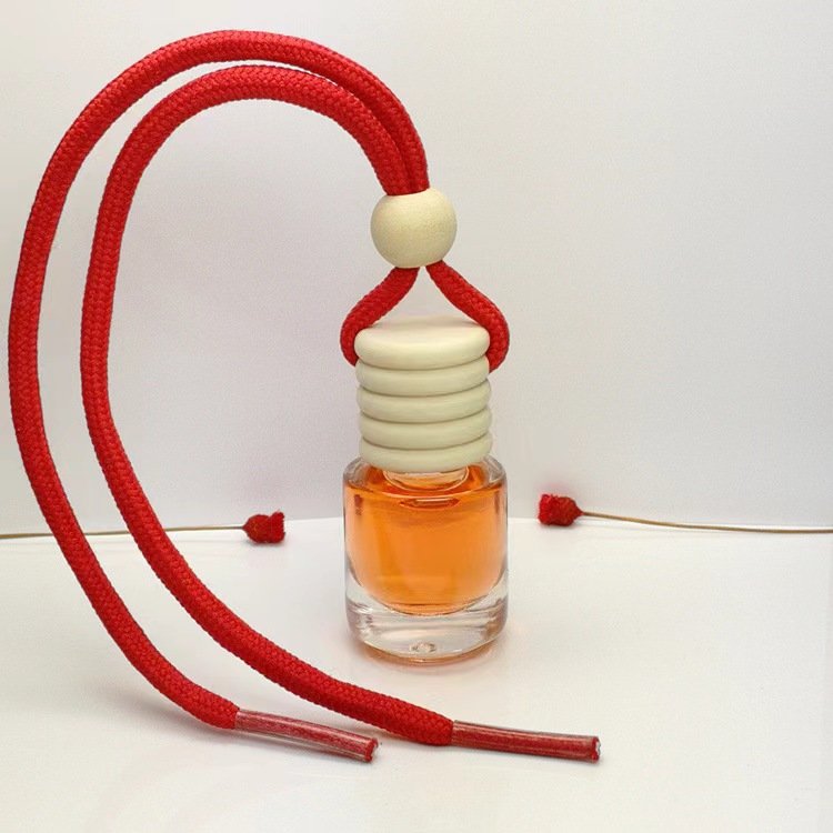 Luxury 5ML Clear Round Hanging Rope Glass Car Perfume Bottle Diffusing Forest Fragrance with Wooden Cap Air Freshener