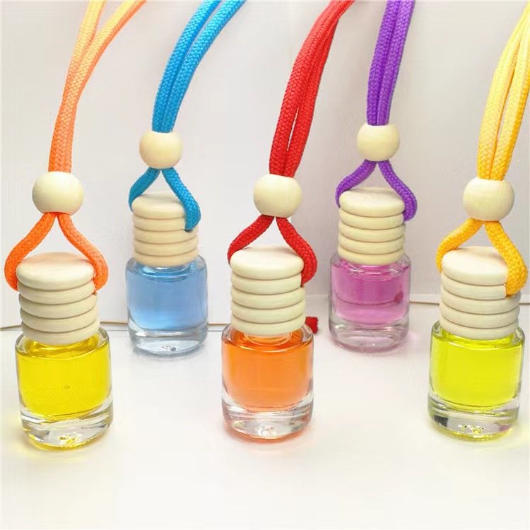 Luxury 5ML Clear Round Hanging Rope Glass Car Perfume Bottle Diffusing Forest Fragrance with Wooden Cap Air Freshener