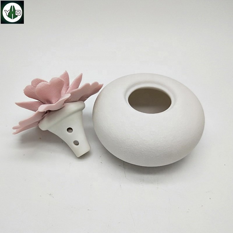 Eco-friendly Handmade matte pink flower ceramic aroma oil diffuser Ceramic Aromatherapy Bottle Car Fragrance Air Purification