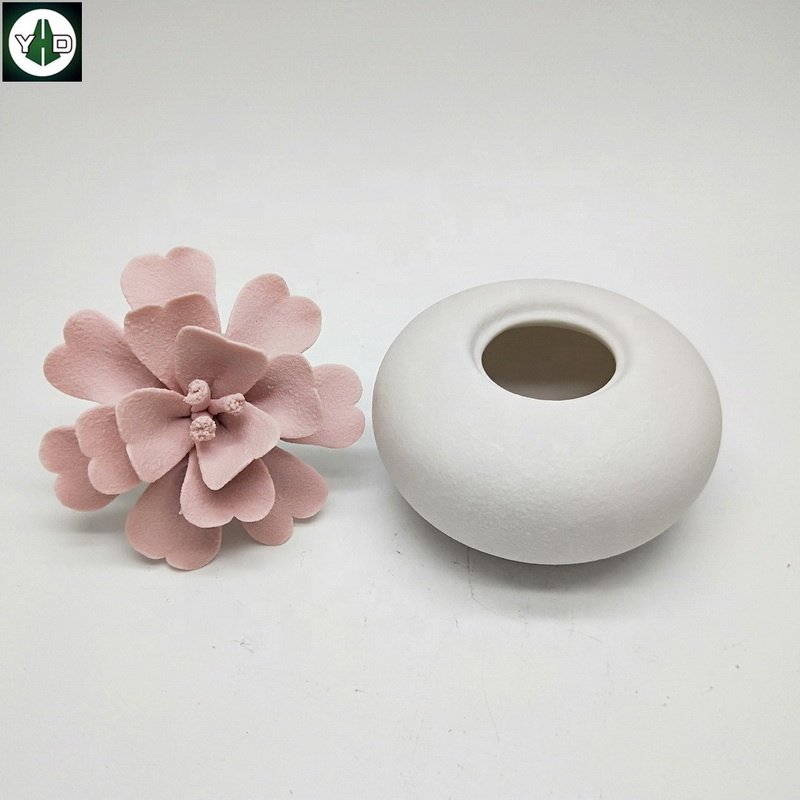 Eco-friendly Handmade matte pink flower ceramic aroma oil diffuser Ceramic Aromatherapy Bottle Car Fragrance Air Purification