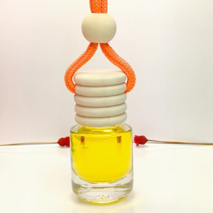 Luxury Car Air Freshener Pendant with Lily Ocean Jasmine Fragrances Hanging Car Perfume Bottle Wooden Cap Modern Style