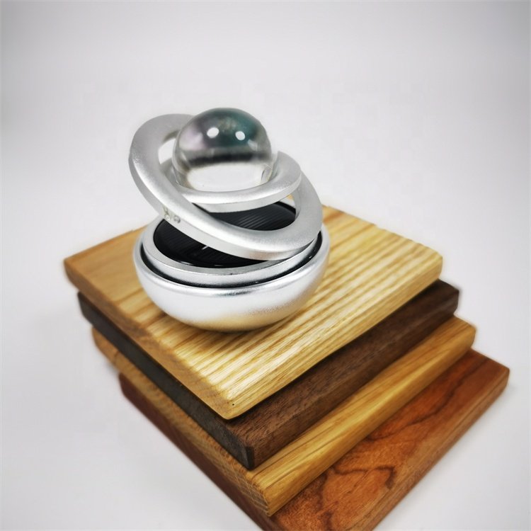 Wholesale Solar Scent Suspended Aromatherapy Perfume with Paper Material Dashboard Automatic Rotating Plastic Car Air Freshener