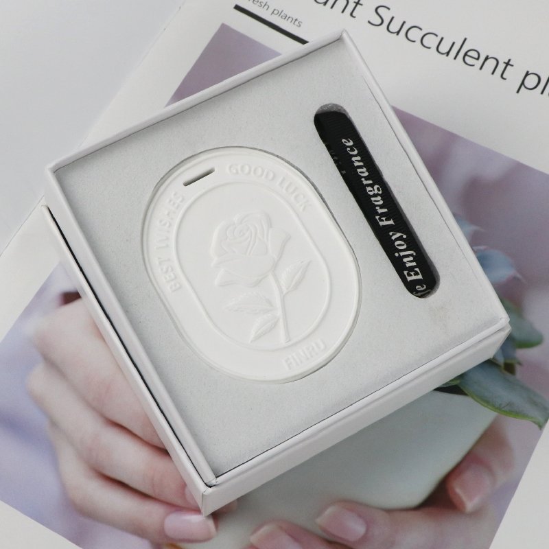 Finru New Product Wholesale Oval White Rose Ceramic Essential Oil Diffuse Plaster Fragrance Car Hanging Decoration Air Freshener