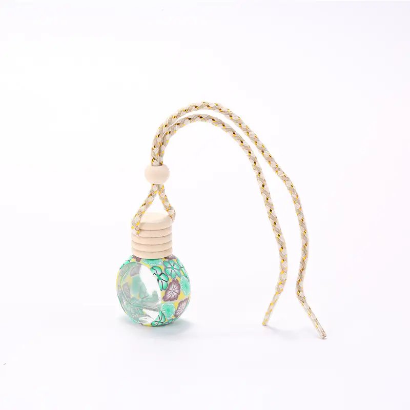 Wholesale custom 10 ml soft pottery perfume in car essential oil hanging car air freshener bottle
