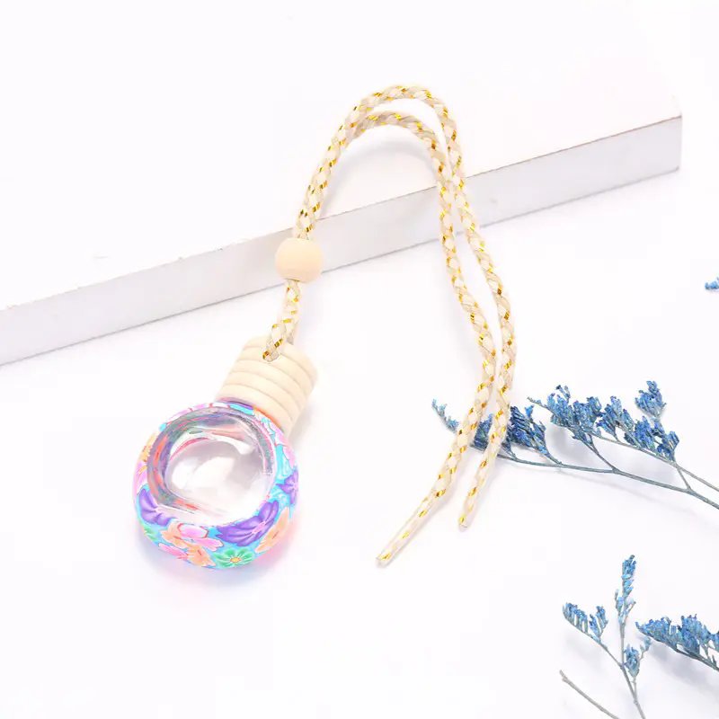 Wholesale custom 10 ml soft pottery perfume in car essential oil hanging car air freshener bottle