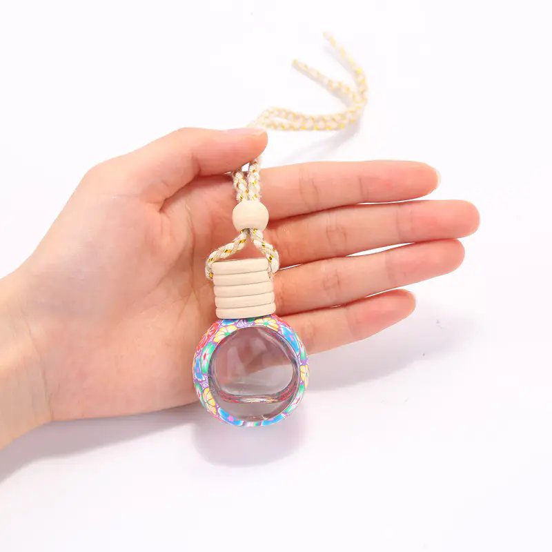 Wholesale custom 10 ml soft pottery perfume in car essential oil hanging car air freshener bottle