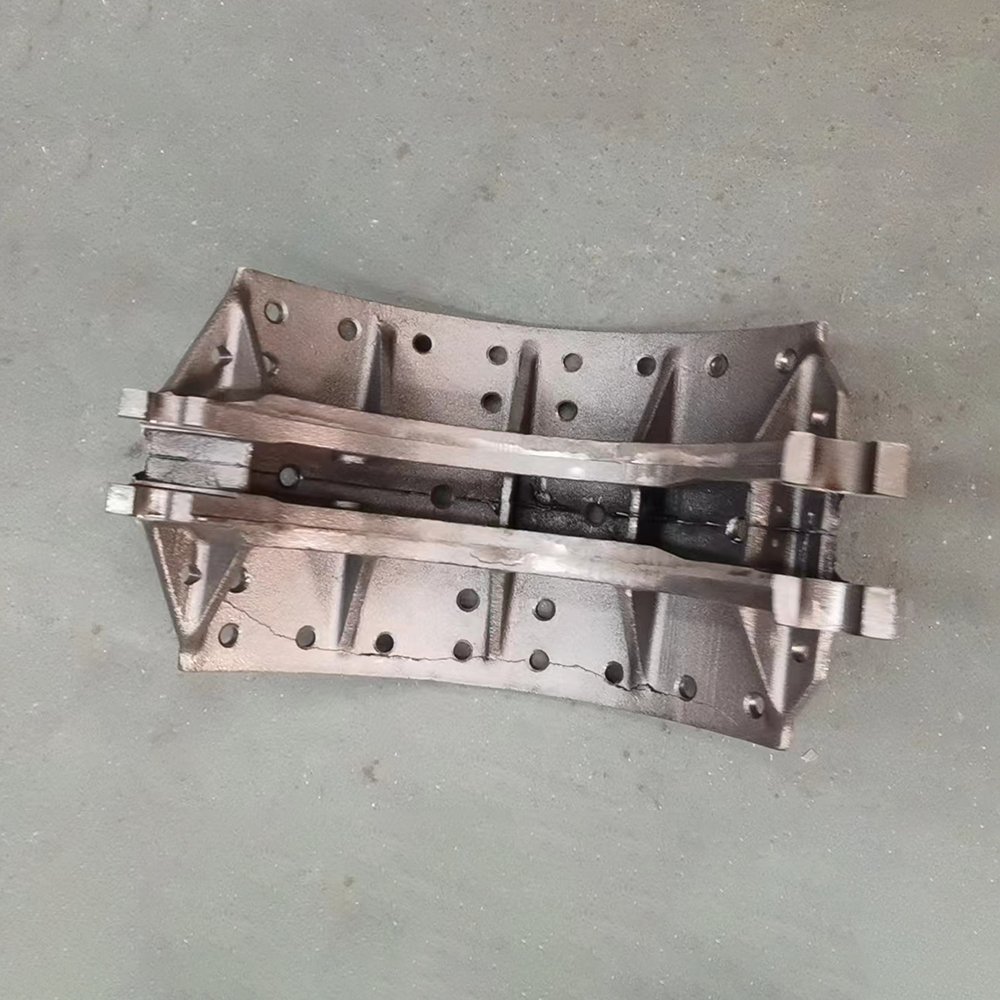 Sinotruk Parts Casting Iron Howo 14 Holes Brake Shoe AZ9231312070 Good Quality Heavy Duty Truck Parts Brake Shoe