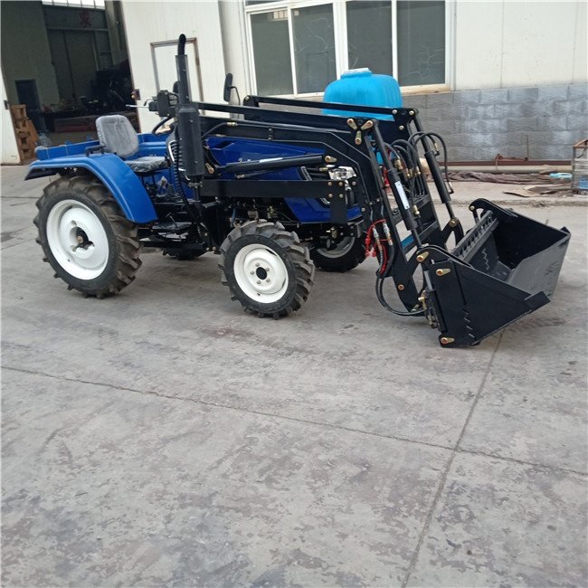 China Made Good Performance 25 hp Tractor with Bucket
