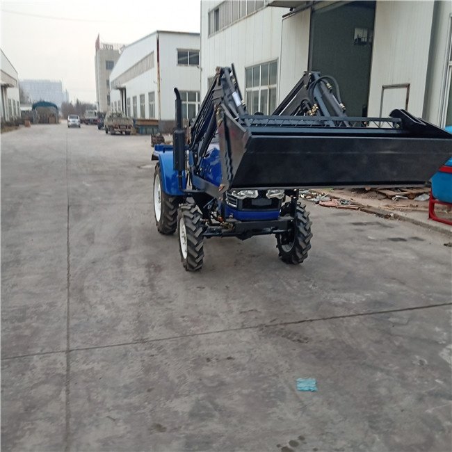 China Made Good Performance 25 hp Tractor with Bucket