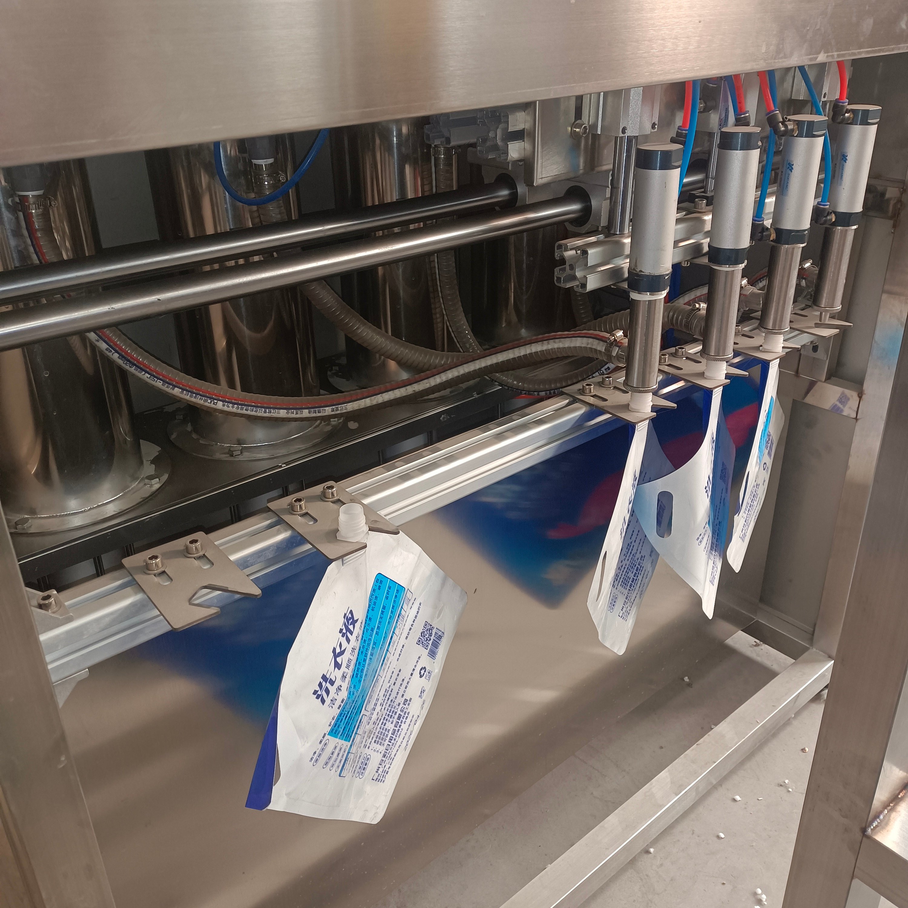 Competitive Price Small Business Liquid Bag Milk Pouch Filling Machine Self-Supporting Suction Nozzle Shampoo Chemical Gear