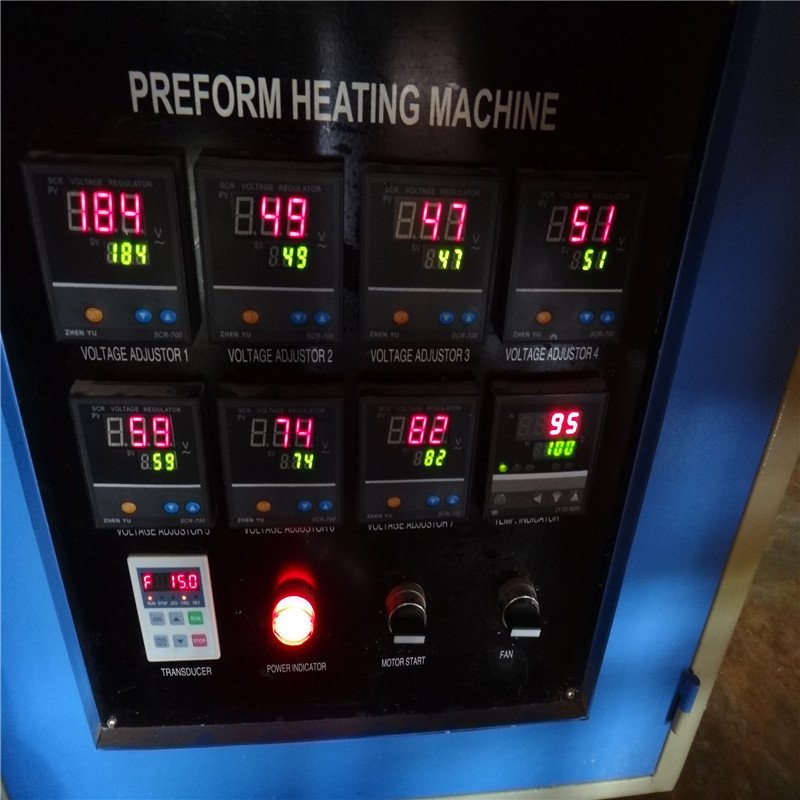 SEMI-AUTO PET BOTTLE BLOW MOULDING MACHINE