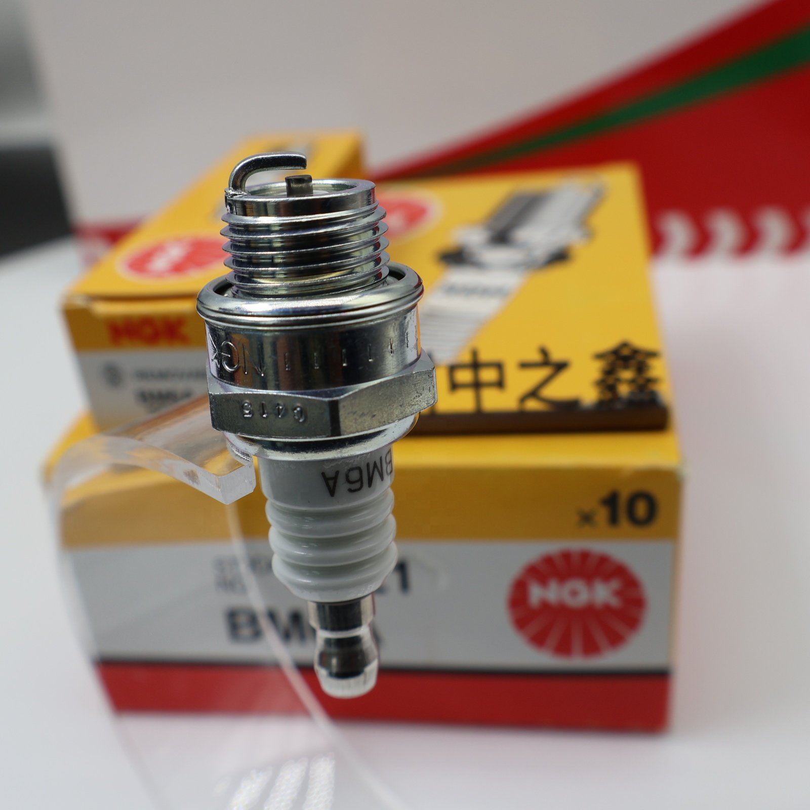 Genuine NGK BM6A 5921 Suitable for gasoline engine accessories micro farm pump generator spark plug