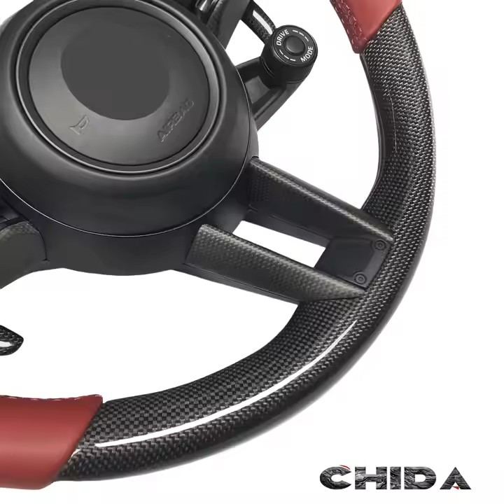 Custom carbon fibre steering wheel with separate SC knob for Porsches 911 718 Boxster Cayenne Panamera 992 987 918 997 991
