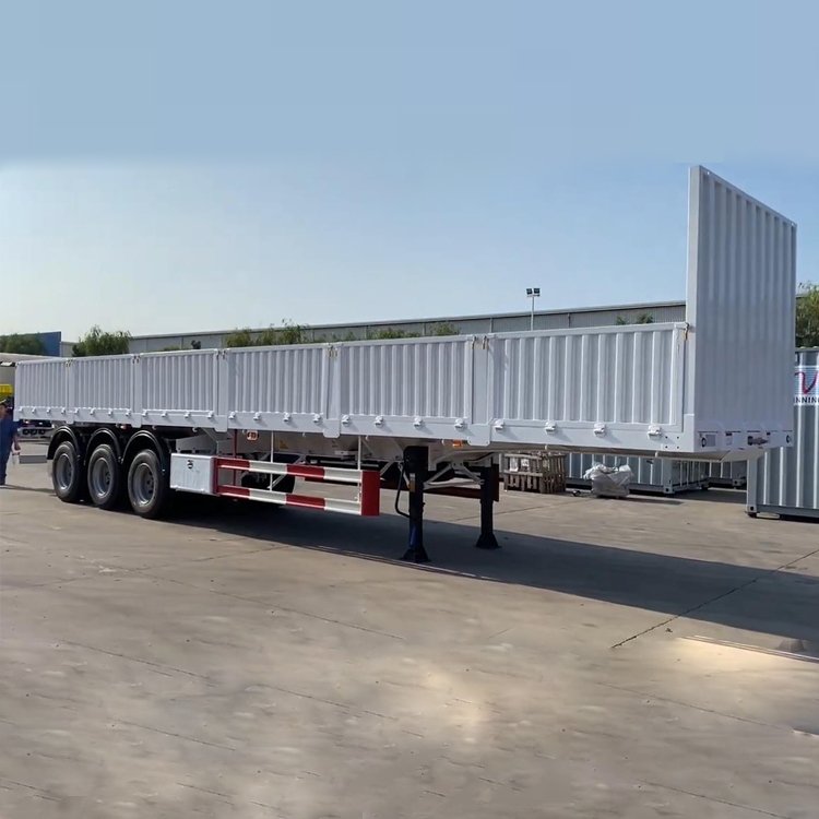 China 4 Axle Heavy Duty Container Flatbed Semi-Trailer 3 Axles 40FT Container Transport Flatbed Semi Trailer