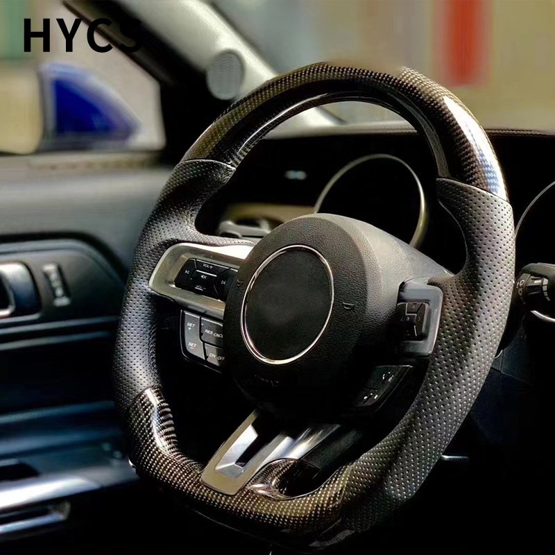 Car interior carbon fiber steering wheel covered with black perforated leather suitable for Ford Mustang after 2015